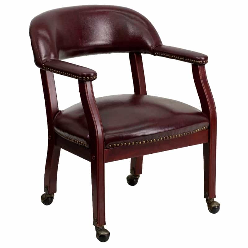 Sarah Oxblood Vinyl Luxurious Conference Chair With Accent Nail Trim And Casters